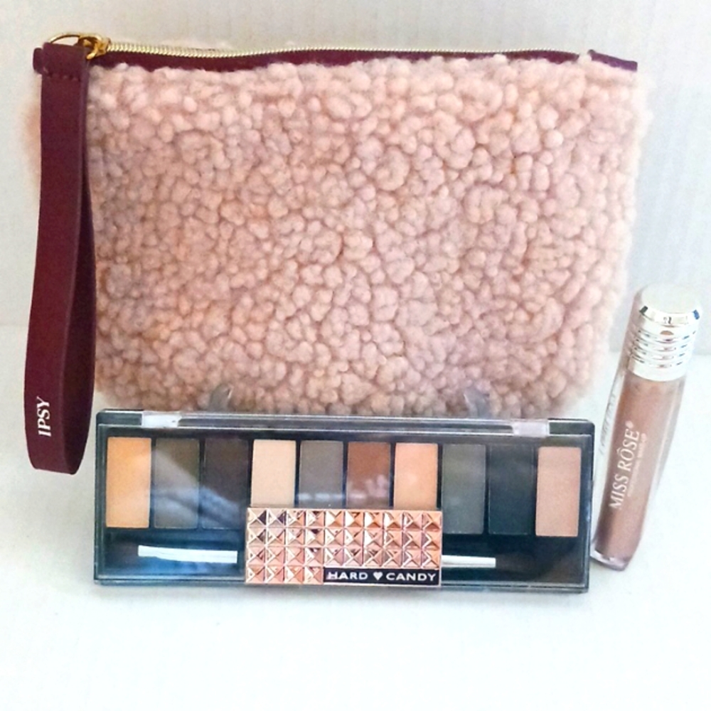 NWT HARD CANDY EYESHADOW PALLETTE WITH COSMETIC BAG AND LIP GLOSS